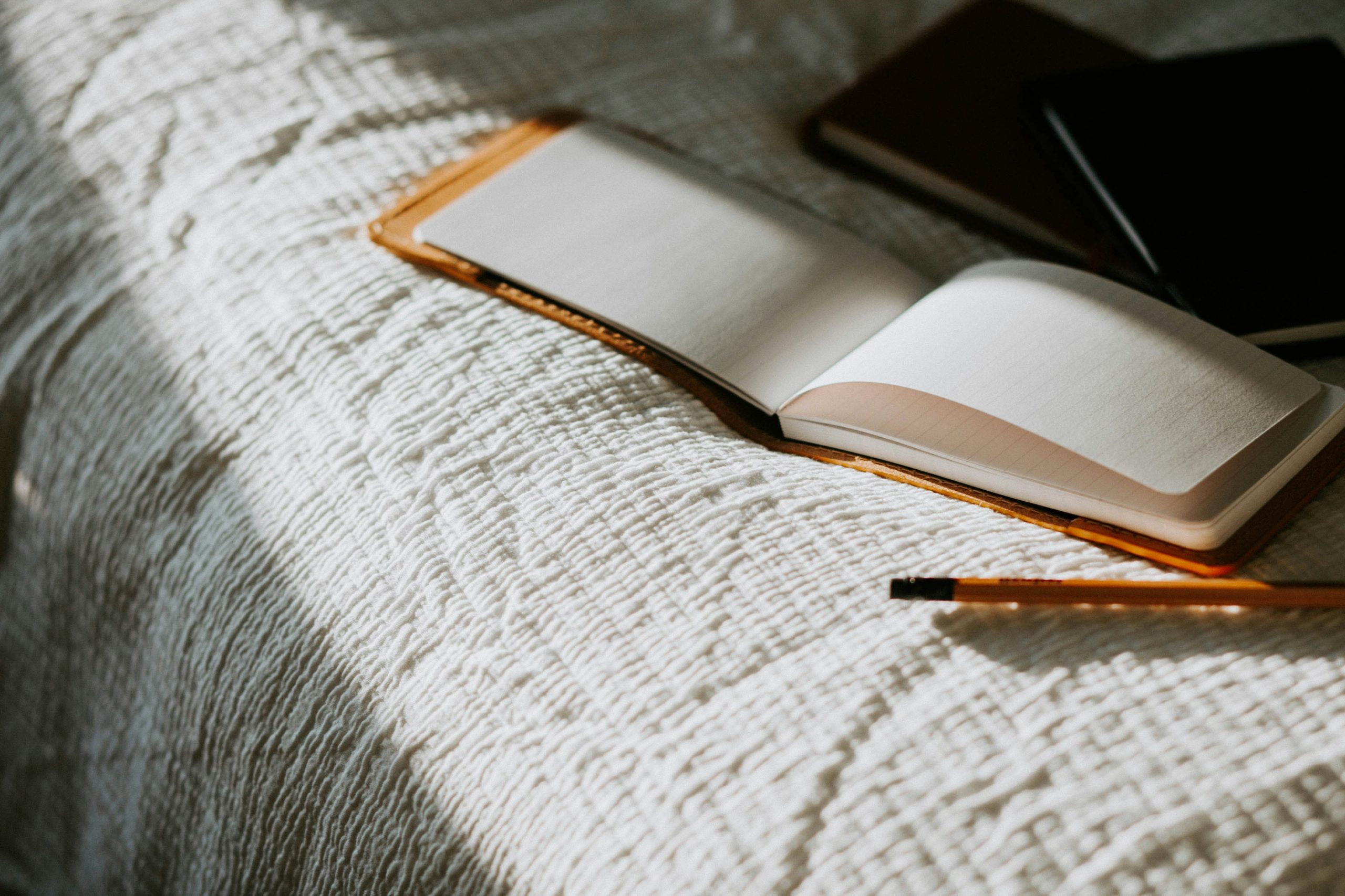 book open on bed